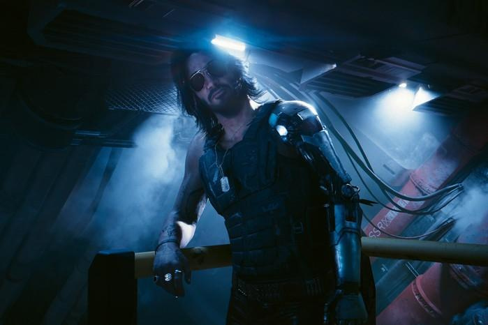 Cyberpunk 2077 Phantom Liberty DLC Keanu Reeves in Cyberpunk with metal arms, leaning on some railings