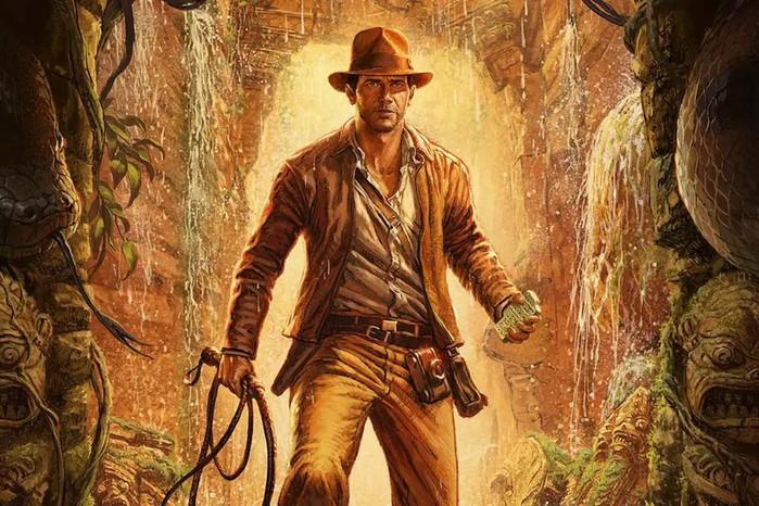 indiana-jones-great-circle-setting Image of Indiana Jones holding a whip in right hand and an artefact in left hand. Jones is standing inside a rock formation featuring green plants growing up the walls.